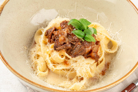 Portion of braised beef pasta pappardelleの写真素材