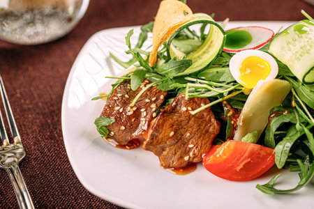 Gourmet warm salad with meat and vegetablesの写真素材