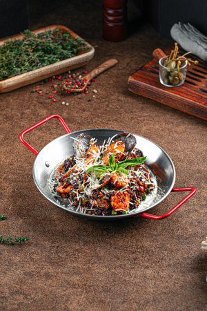 Portion of wild rice risotto with seafoodの写真素材