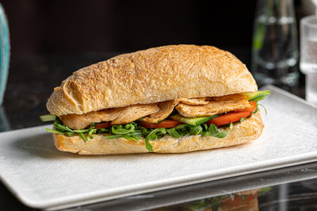 Ciabatta sandwich with chicken and saladの写真素材