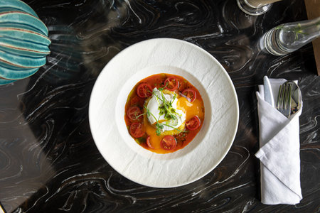 Portion of gourmet italian breakfast with mozzarellaの写真素材