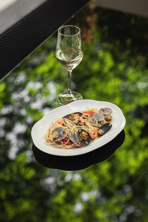 Portion of seafood pescatore sauce pasta spaghettiの写真素材