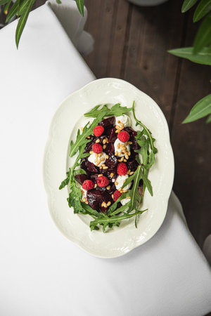 Portion of beet salad with arugulaの写真素材