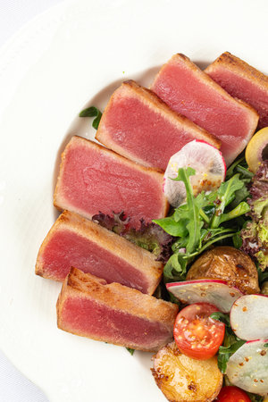 Portion of tuna salad with eggsの写真素材