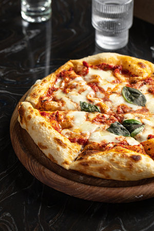 Portion of baked italian pizza margheritaの写真素材