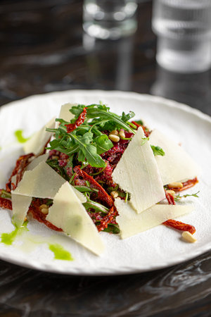 Portion of baked beet salad with cheeseの写真素材