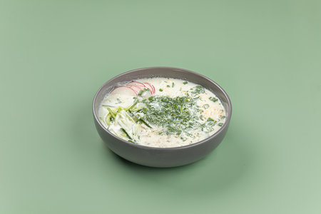 Portion of cold summer russian soup okroshka
