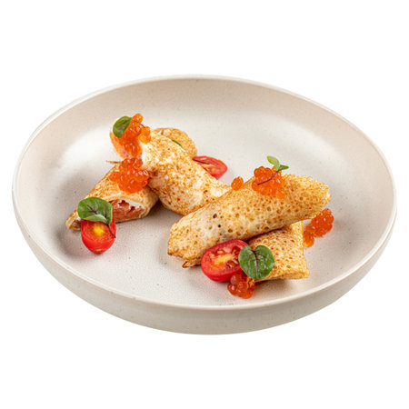 Portion of crepe rolls with salmon and red caviarの写真素材