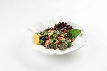 Portion of gourmet seafood salad with greensの写真素材
