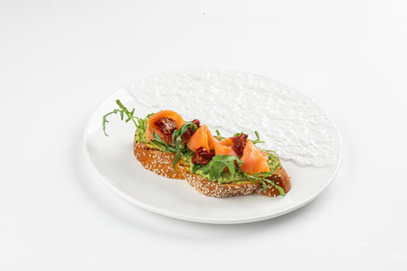 Gourmet bruschetta with salmon and dried tomatoesの写真素材