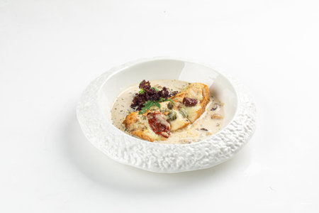 Portion of chicken fillet with mushroom sauceの写真素材