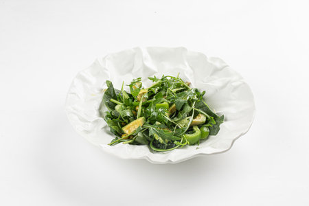 Portion of green salad with avocadoの写真素材