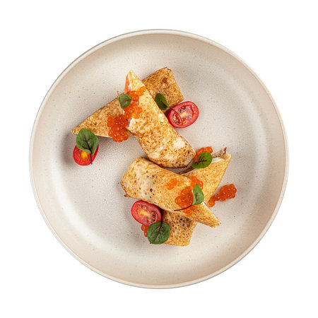 Portion of crepe rolls with salmon and red caviarの写真素材
