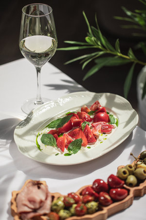Restaurant terrace table served with appetizersの写真素材