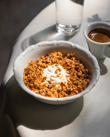 Portion of gourmet granola and yogurt bowlの写真素材