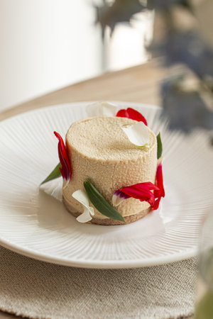 Elegant mousse dessert with flower petals