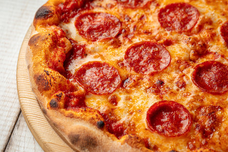 Pepperoni pizza with melted cheeseの写真素材