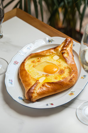 Adjarian khachapuri with egg and cheese