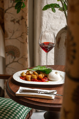 Burrata with roasted chicken and red wine