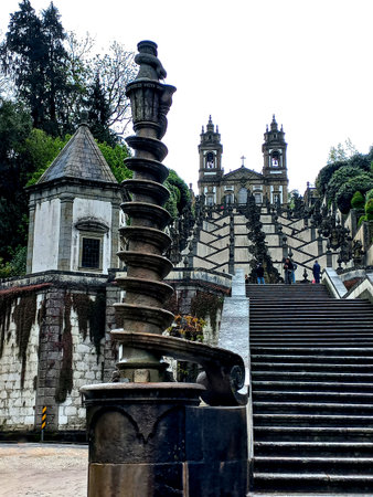 Braga Portugal March 29 2024 Majestic baroque stairway of Bom Jesus do Monte featuring ornate fountains and sculptural symmetry leading to the sanctuaryの写真素材