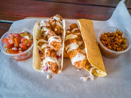 Fish tacos with salsa and riceの写真素材