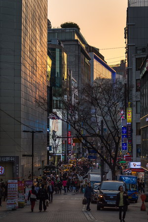 Myeong-dong, Seoul, South Korea- March 2019: Sunset of Myeong-dong shopping streets.のeditorial素材