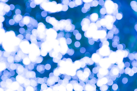 blue abstract background with out of focus lightsの写真素材