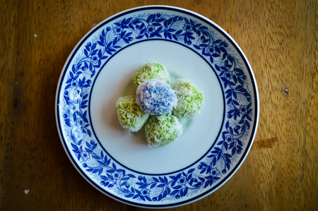 Thai boiled Sweets with Shredded coconuts on the dish top view