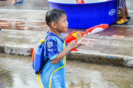 Chiang Rai, Thailand - April 12, 2015 : The Songkran festival or Thai New Year's festival . Songkran is the holiday known for its water festival. Water fights in the town.のeditorial素材