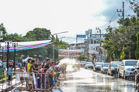 Chiang Rai, Thailand - April 12, 2015 : The Songkran festival or Thai New Year's festival . Songkran is the holiday known for its water festival. Water fights in the town.のeditorial素材