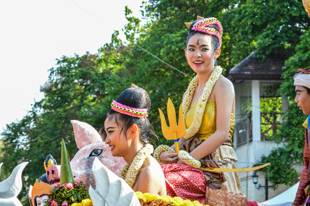 Chiang Rai, Thailand - April 12, 2015 : The Songkran festival parade. Songkran is the holiday known for its water festival. The girl is crowned to be "Miss Songkran"のeditorial素材