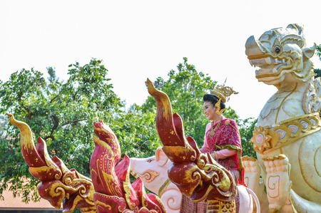 Chiang Rai, Thailand - April 12, 2015 : The Songkran festival parade. Songkran is the holiday known for its water festival. The girl is crowned to be "Miss Songkran"のeditorial素材