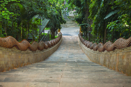 Chiang Rai, Thailand - October 1, 2016: The stairsway to the Wat Phra That Doi Ngam Muang templeのeditorial素材