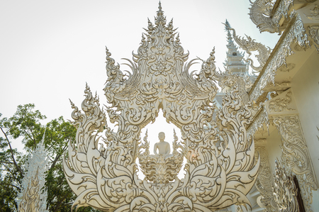 Chiang Rai, Thailand - April 4, 2017 : Wat Rong Khun or White Temple, designed and constructed by Chalermchai Kositpipat.のeditorial素材