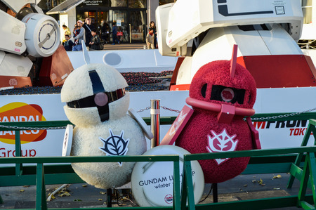 Tokyo, Japan. 13 January 2014. Gundam Statue Model  and friends, Performances Outside Diver City Tokyo Plaza, landmark in Odaibaのeditorial素材