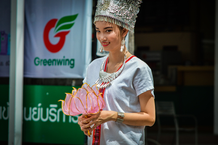 Chiang Rai, Thailand - July 7, 2017 : Candle Festival Parades are paraded around Chiang Rai town.  In Thailand associates with Buddhist agenda called Buddhist Lent. Thai Lanna people hold an offering.のeditorial素材