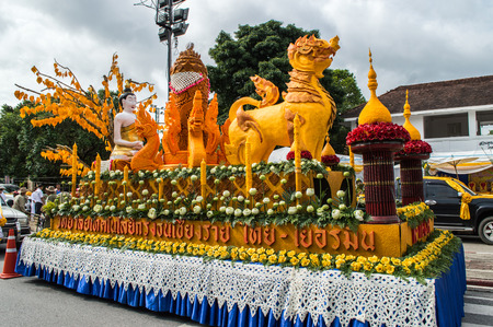 Chiang Rai, Thailand - July 7, 2017 : Candle Festival Parades are paraded around Chiang Rai town.  In Thailand associates with Buddhist agenda called Buddhist Lent. The ornately carved beeswax candles.のeditorial素材
