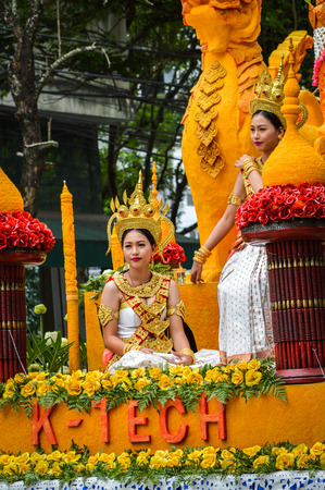 Chiang Rai, Thailand - July 7, 2017 : Candle Festival Parades are paraded around Chiang Rai town.  In Thailand associates with Buddhist agenda called Buddhist Lent. Beautiful lady on the float.のeditorial素材