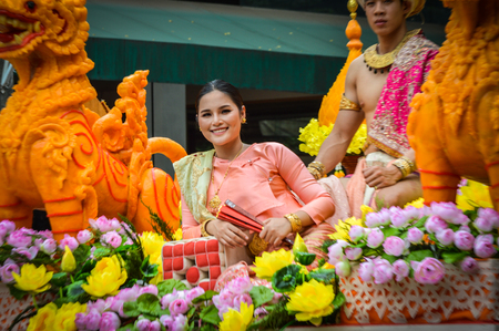 Chiang Rai, Thailand - July 7, 2017 : Candle Festival Parades are paraded around Chiang Rai town.  In Thailand associates with Buddhist agenda called Buddhist Lent. Beautiful lady on the float.のeditorial素材