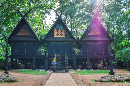 Chiang Rai, Thailand - June 23, 2017 : Baandam Museum (Black House), a place for collecting the local art, created and designed by Thawan Duchanee. Triplets black house.のeditorial素材