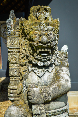 Chiang Rai, Thailand - June 23, 2017 : Baandam Museum (Black House), a place for collecting the local art, created and designed by Thawan Duchanee. Balinese God statue is in front of Xieng Thong Houseのeditorial素材