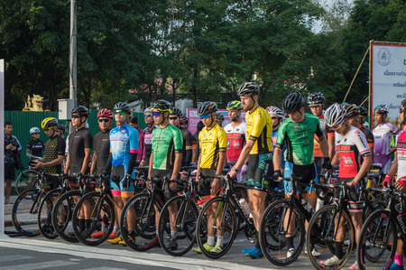 Chiang Rai, Thailand â December 16, 2017 : Tour of Chiang Rai, The cycling touring road event complying with international standard. Singha - Bangkok airways bicycles racing state 3 . Group professional cyclists in the front row ready to start.のeditorial素材