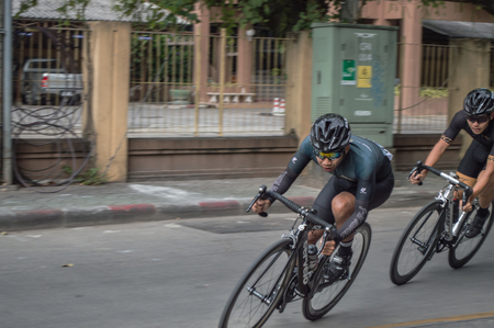 Chiang Rai, Thailand â December 17, 2017 : Tour of Chiang Rai, The cycling touring road event complying with international standard. Singha - Bangkok airways bicycles racing state 4 .のeditorial素材