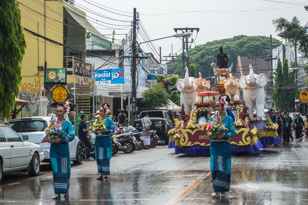Chiang Rai, Thailand - April 13, 2018 : Songkran festival at Suan Tung Lae Khom Chiang Rai Park in Chiang Rai. Participants in a Songkran Festival parade.のeditorial素材