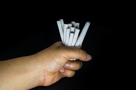 A pack of cigarettes on black backgroundの写真素材