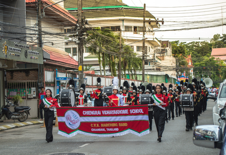 CHIANG RAI, THAILAND - September 14, 2018 : Chiengrai Vidhayakhome School students parade in annual Sports Days. Students in the marching band uniform walking on the streets around the city.のeditorial素材
