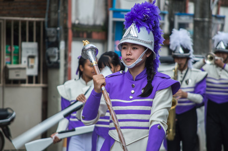 CHIANG RAI, THAILAND - September 14, 2018 : Chiengrai Vidhayakhome School students parade in annual Sports Days. Tessaban 5 Denha School bands performing a marching during school sports day.のeditorial素材