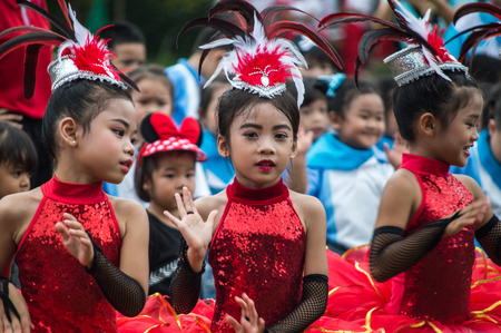 CHIANG RAI, THAILAND - September 14, 2018 : Chiengrai Vidhayakhome School students parade in annual Sports Days. Elementary students are dancing performing show.のeditorial素材