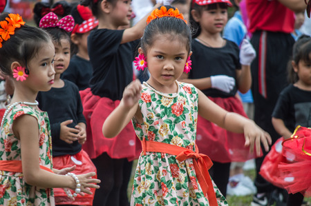 CHIANG RAI, THAILAND - September 14, 2018 : Chiengrai Vidhayakhome School students parade in annual Sports Days. Elementary students are dancing performing show.のeditorial素材