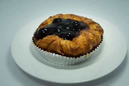 Closed up of Danish blueberry pie on white plate.の写真素材